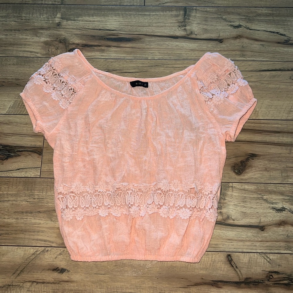peach colored top
